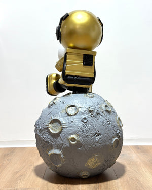 man moon sitting gold