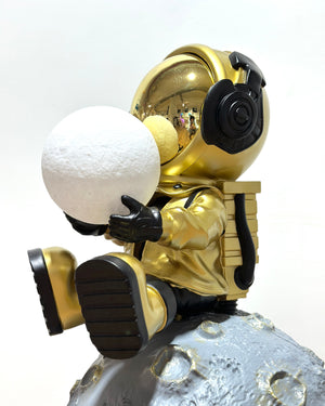 man moon sitting gold